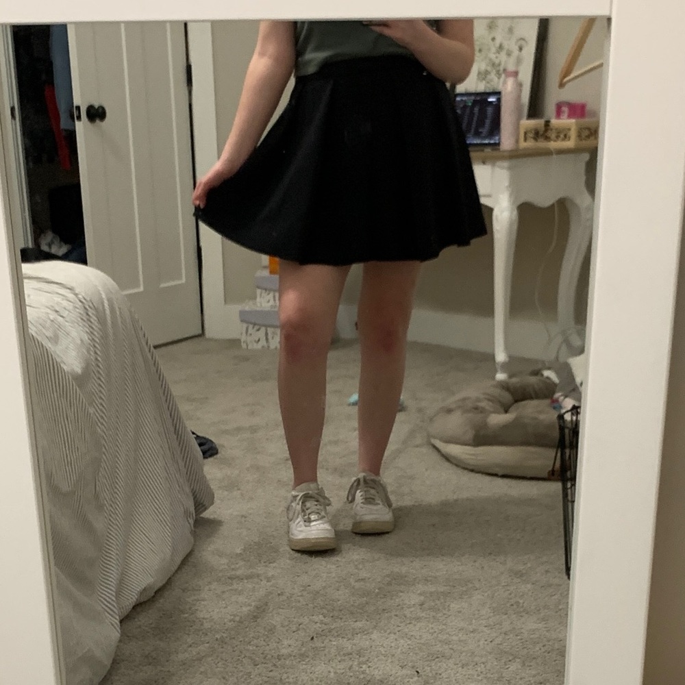 black pleated skirt